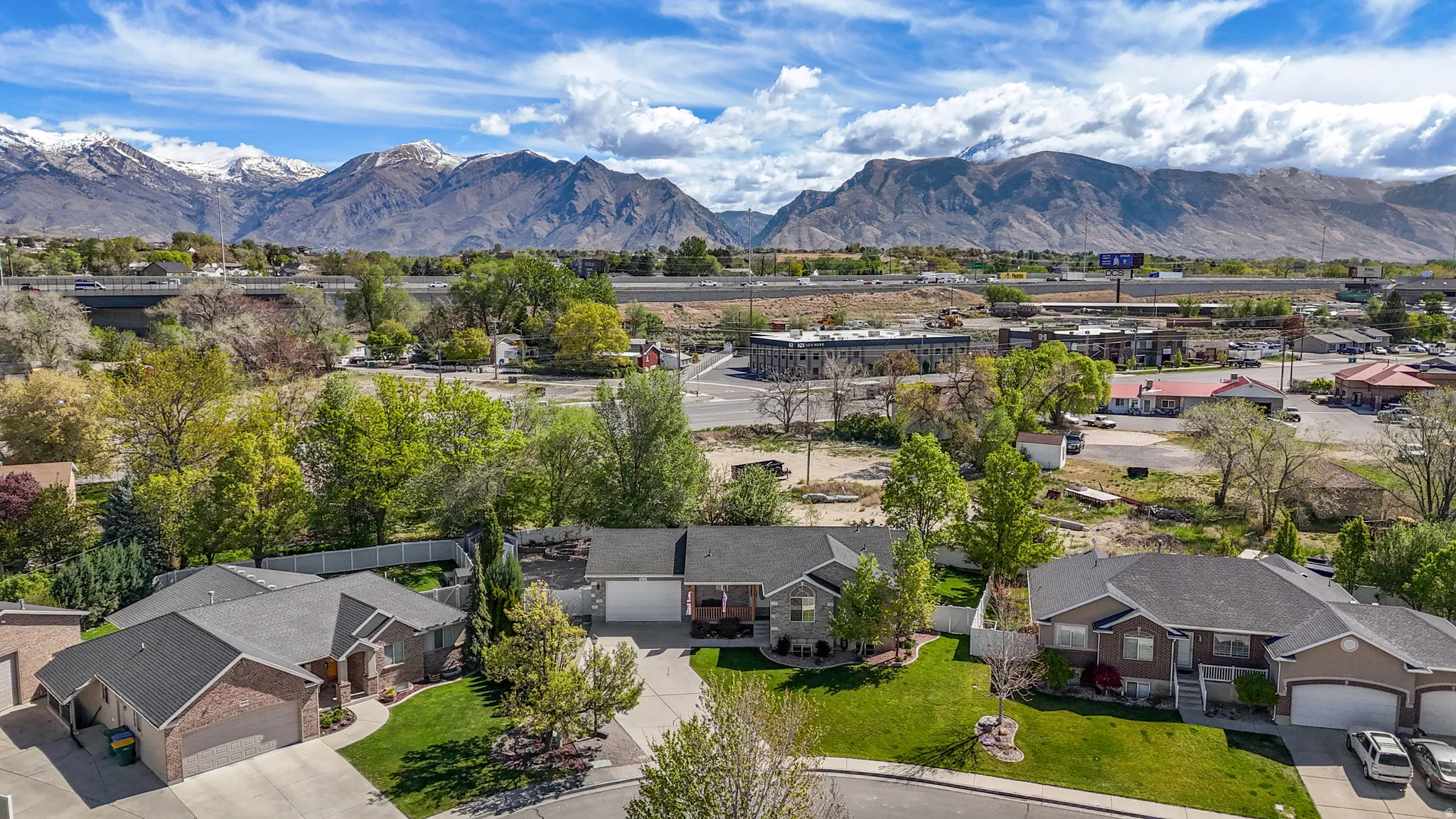 Aerial view of residential area with mountains