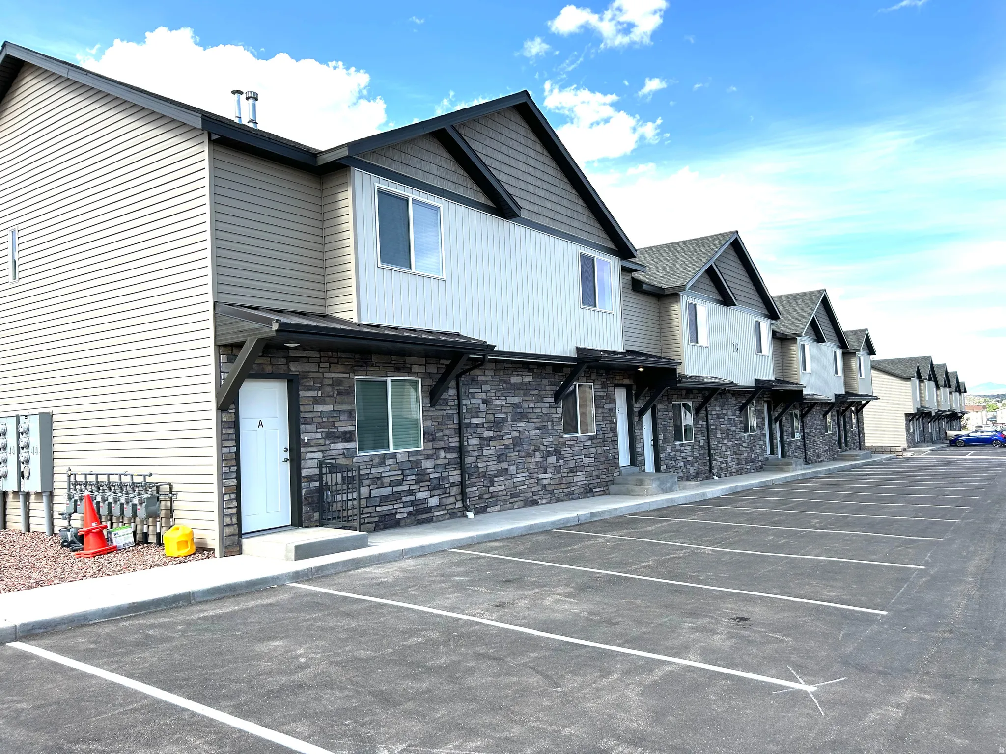 Uncovered parking lot with a residential view