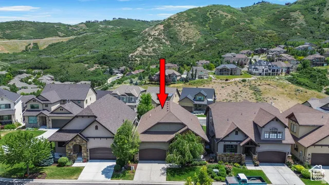 Aerial perspective of suburban area with mountains