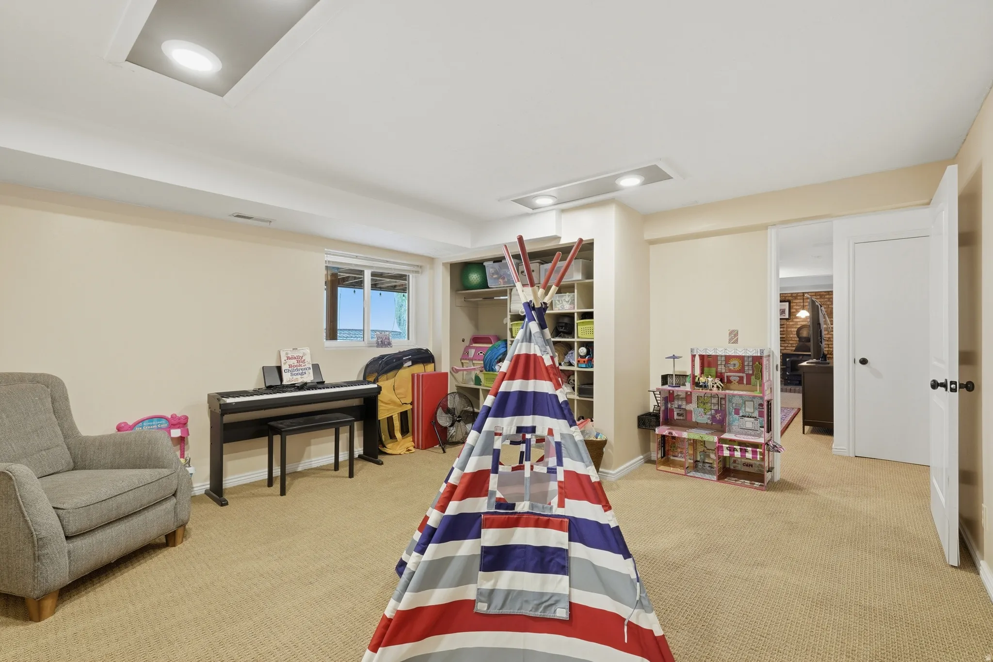 Rec room featuring light carpet and recessed lighting
