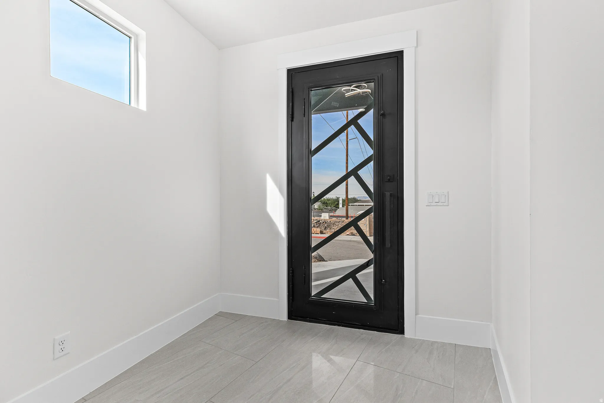 Foyer with baseboards