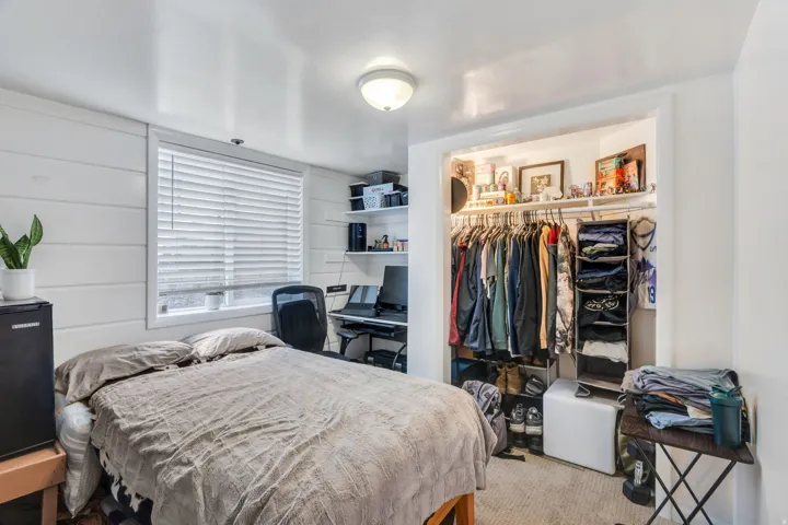 Bedroom #4 is a private bedroom with a double bed