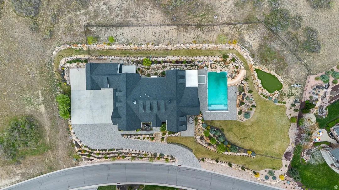 Aerial overview of property's location with a pool