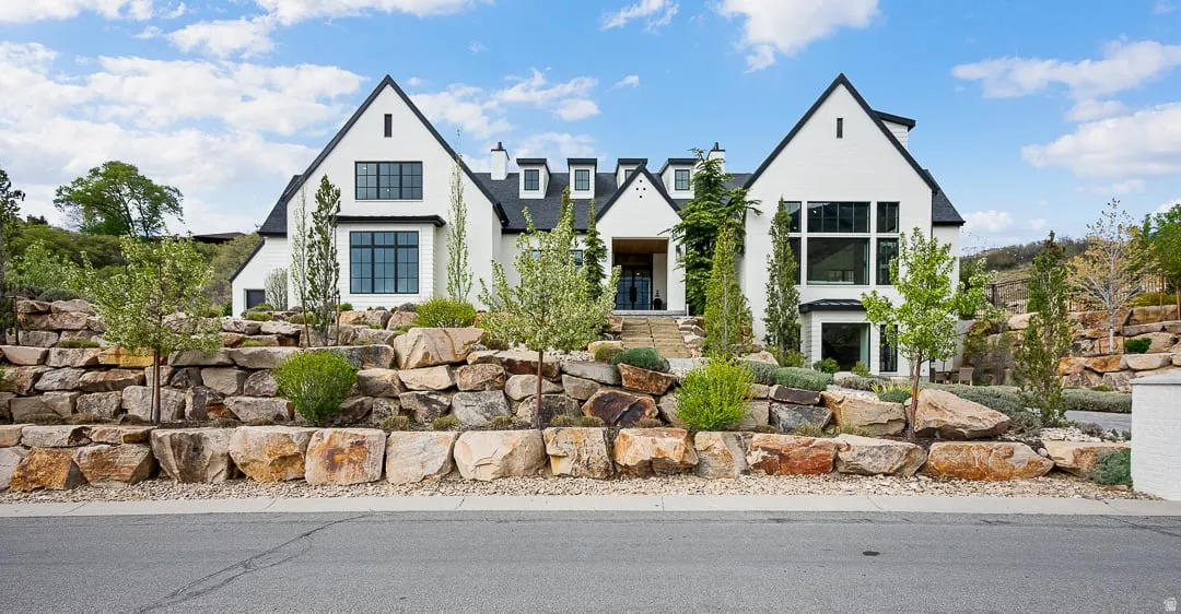View of front of home featuring stucco siding