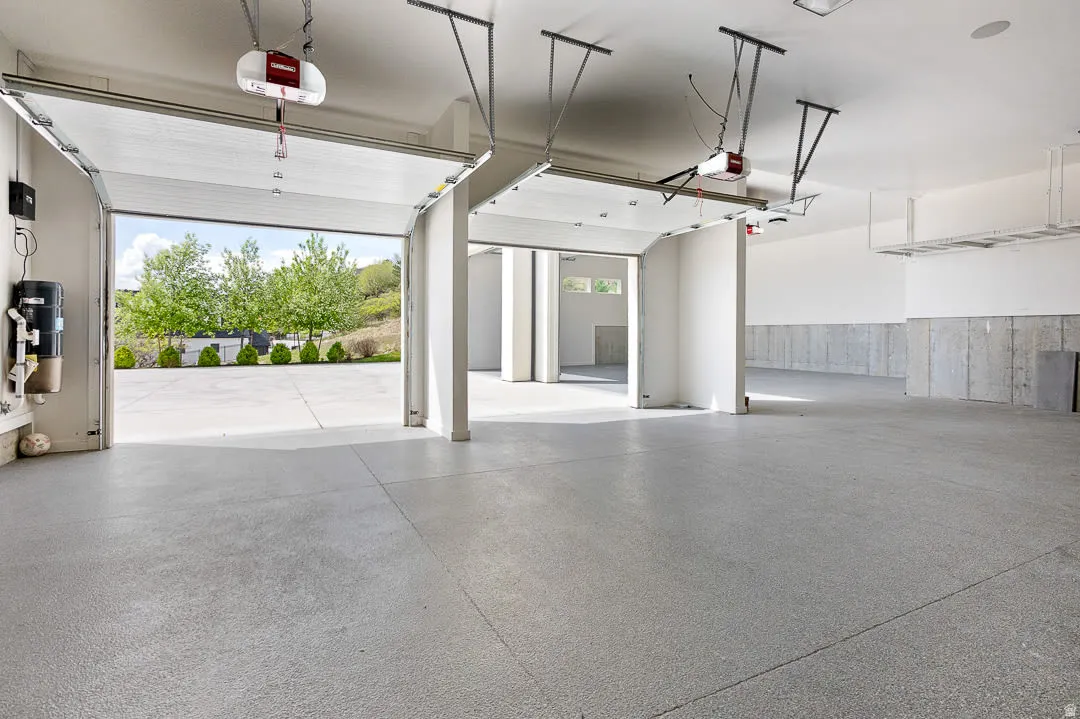 Garage featuring a garage door opener