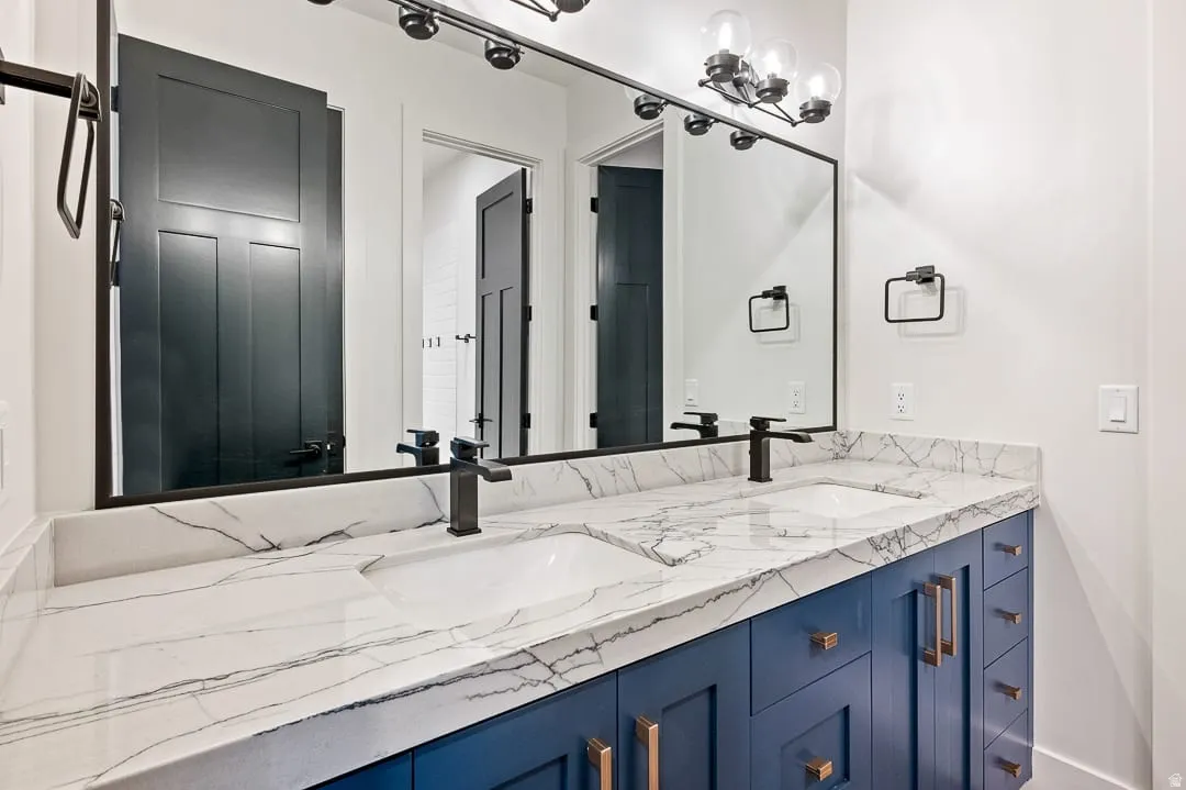Bathroom featuring double vanity