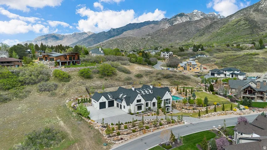 Aerial view of residential area with mountains