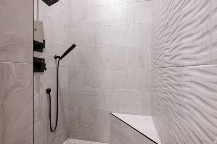 Bathroom with a tile shower