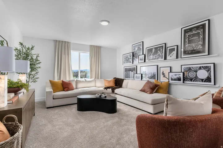 Living room featuring carpet floors and baseboards
