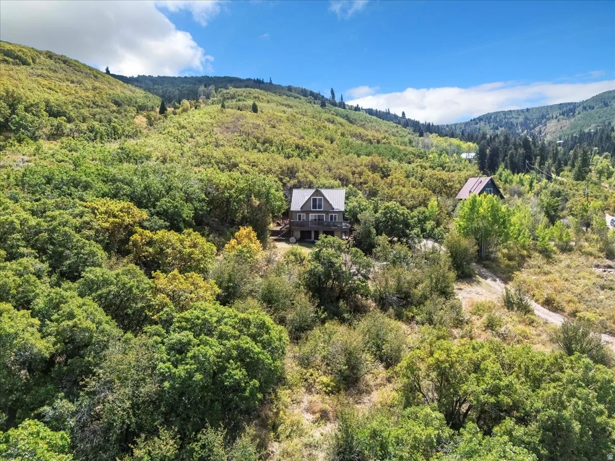 Aerial view of property and surrounding area.