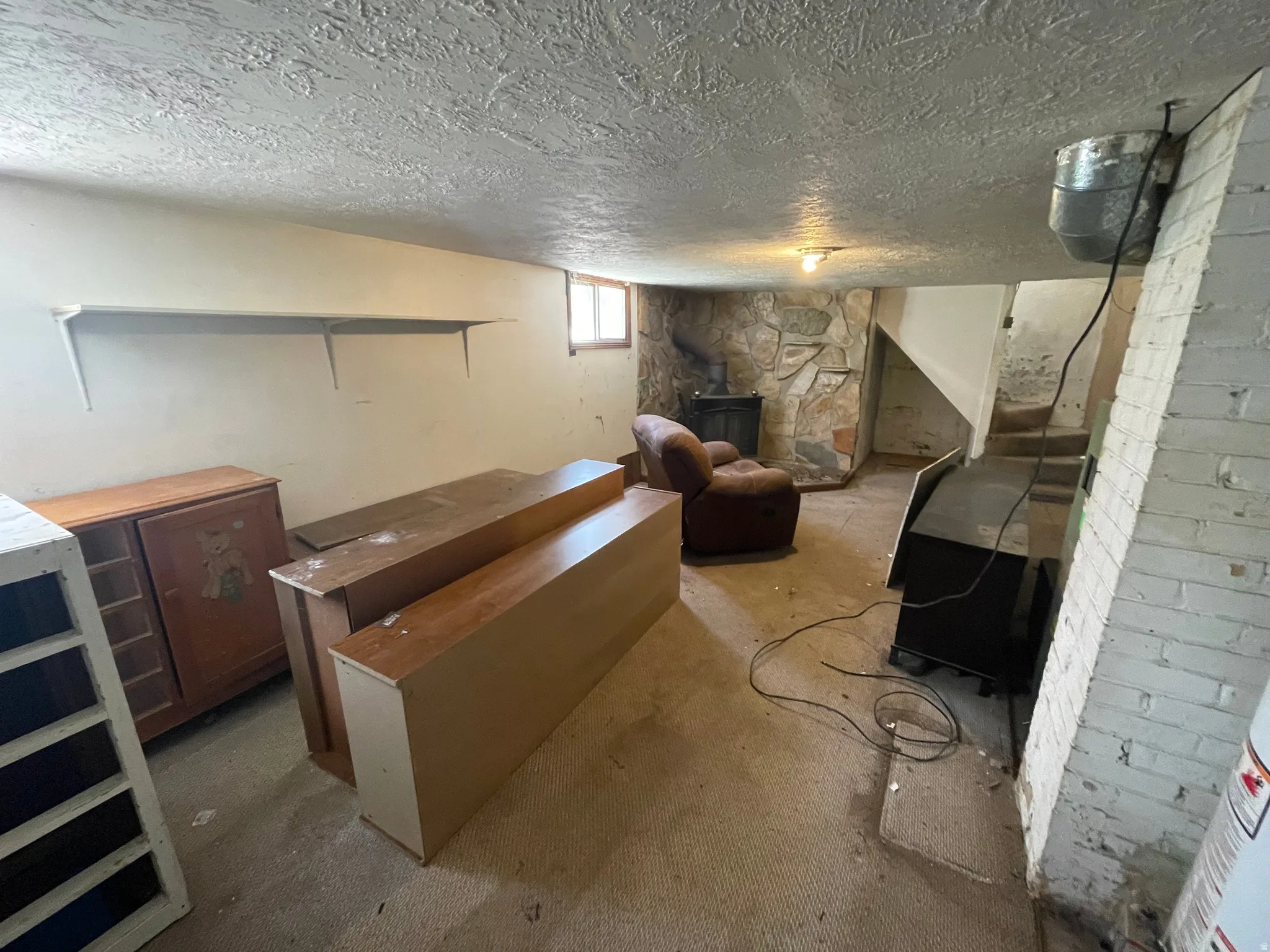 Huge downstairs family room; plenty of space to build a 4th bedroom