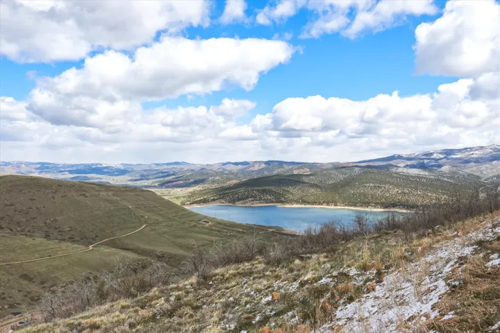Mountain view featuring a large body of water