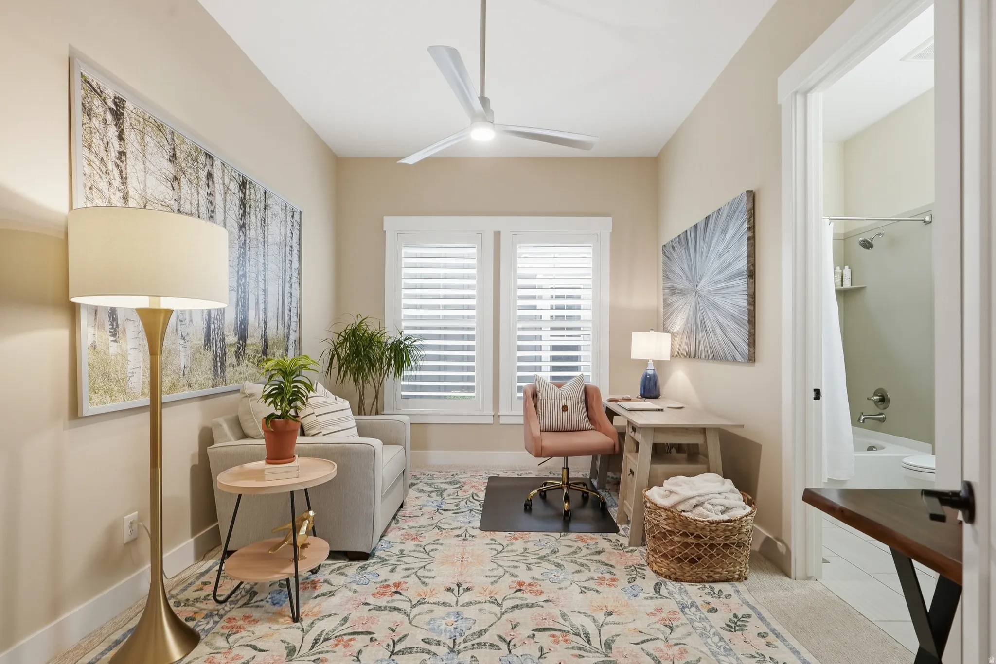 Office featuring ceiling fan and baseboards