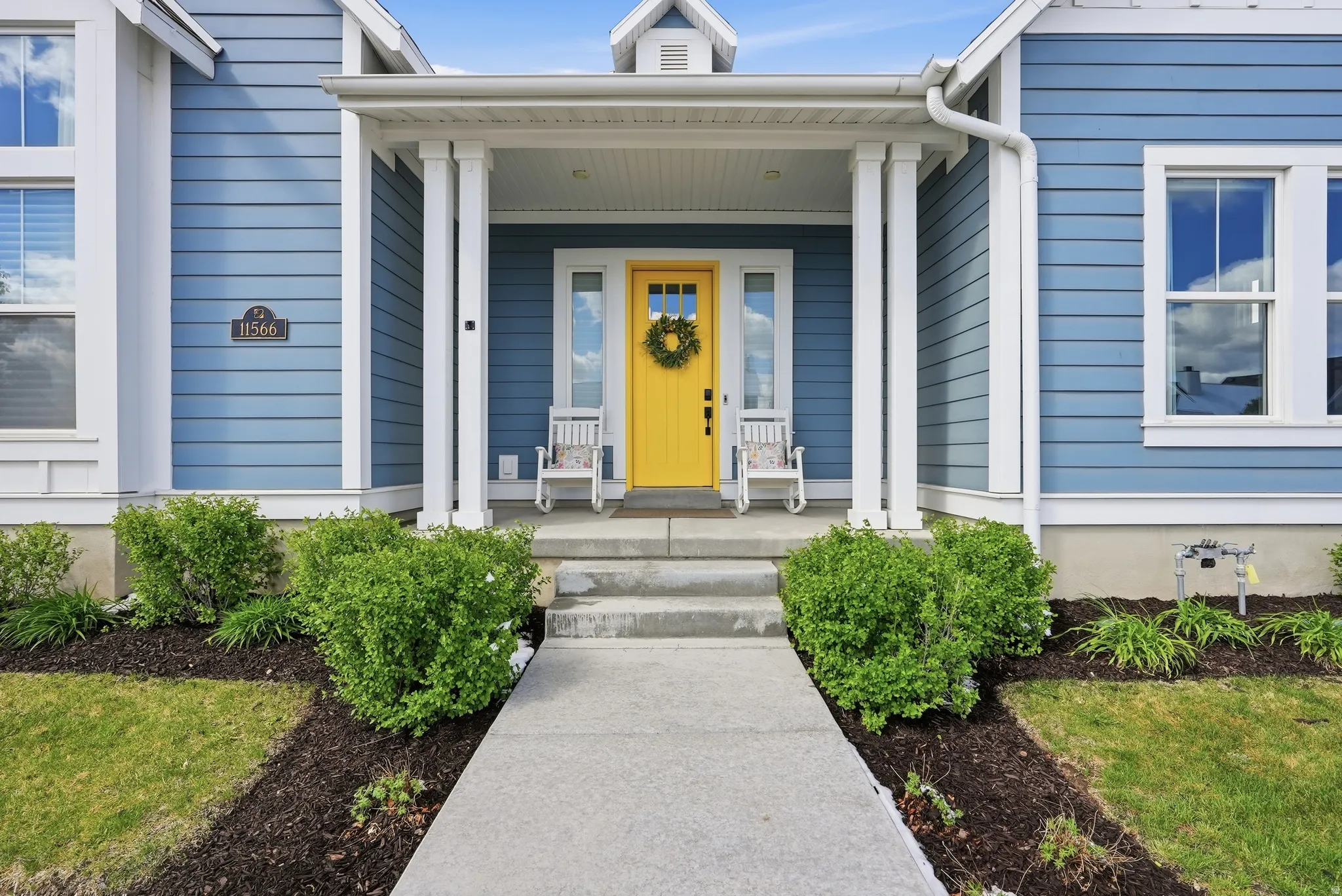 Property entrance with covered porch