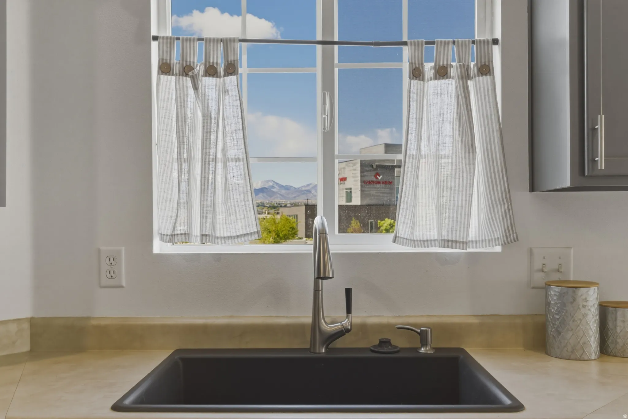 Kitchen view of light countertops