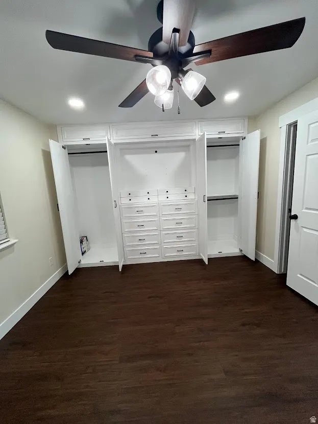 Built-in wardrobe with ample rod space and drawer storage. Additional hidden shoe storage too.