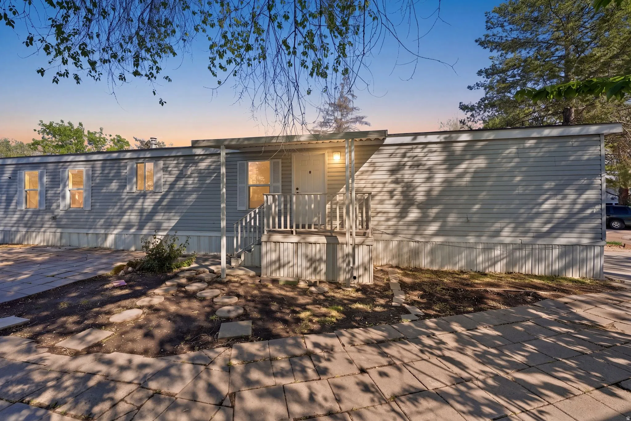 Manufactured / mobile home featuring a patio