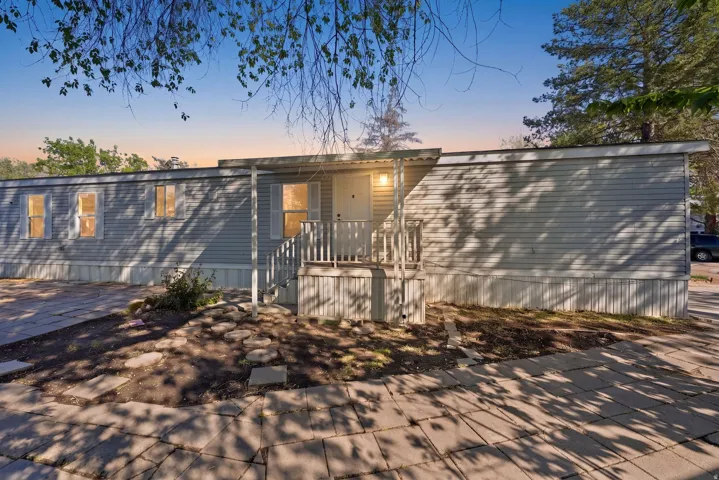 Manufactured / mobile home featuring a patio