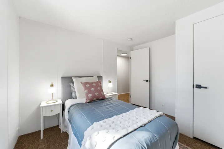 View of carpeted bedroom