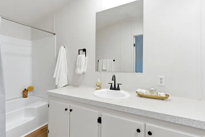 Full bathroom with vanity and shower / bath combination