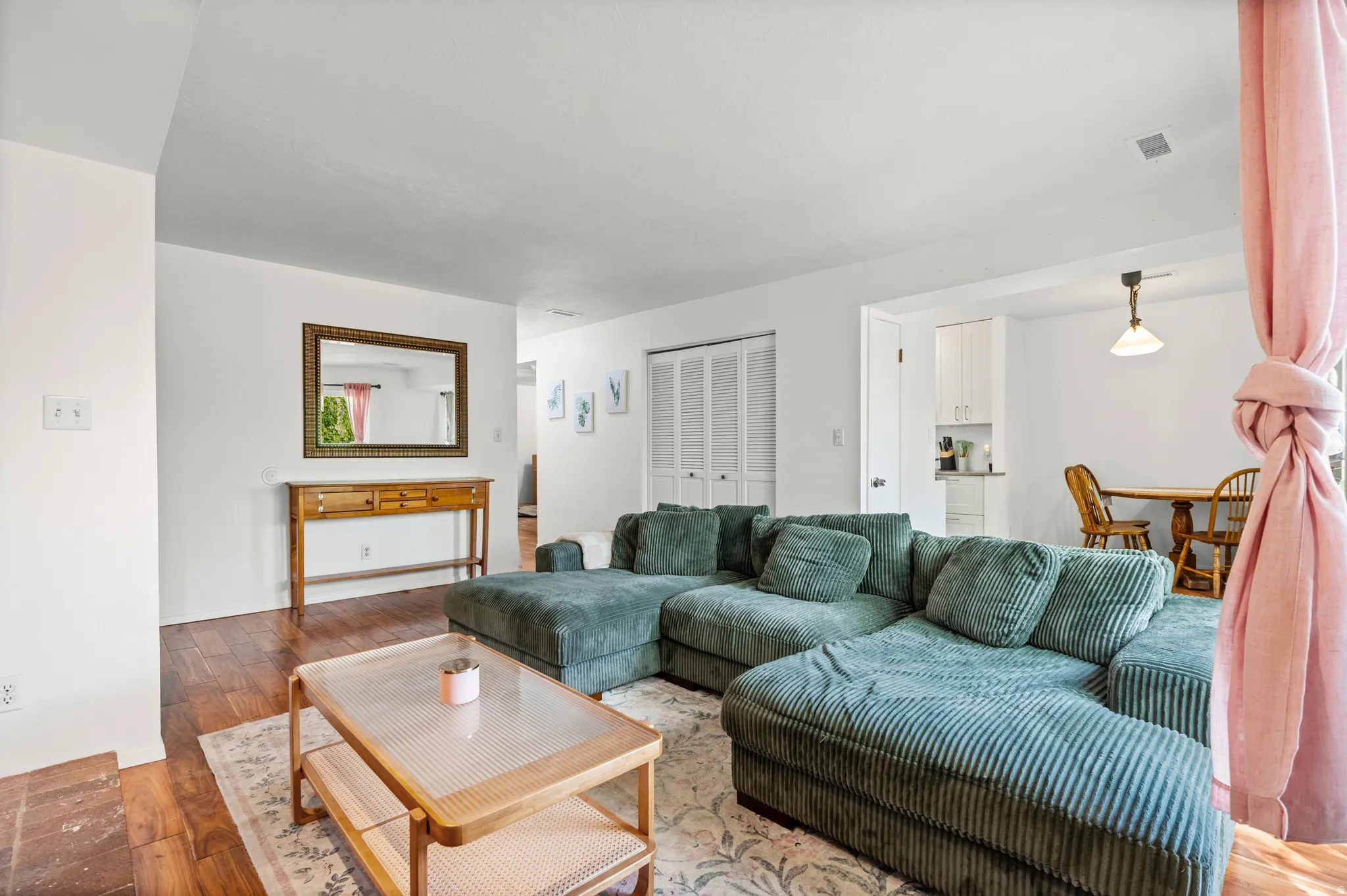 Living area featuring hardwood floors