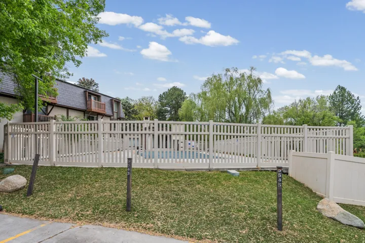 View of yard featuring a community pool