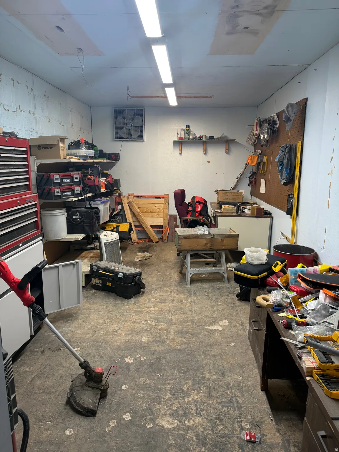 Below grade area featuring a workshop area