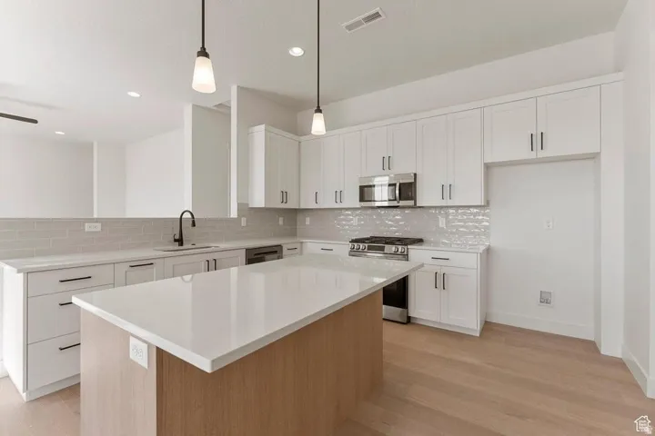 Representative photos of the same floor plan. Actual home may differ in finishes, colors, and options.