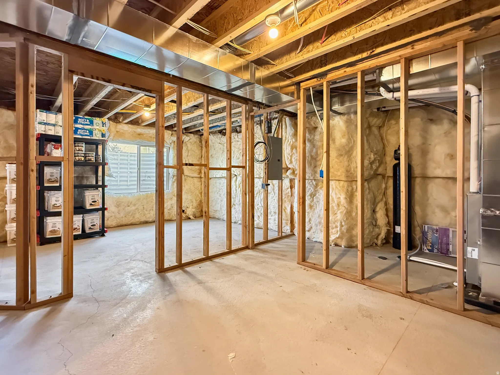 Below grade area featuring electric panel