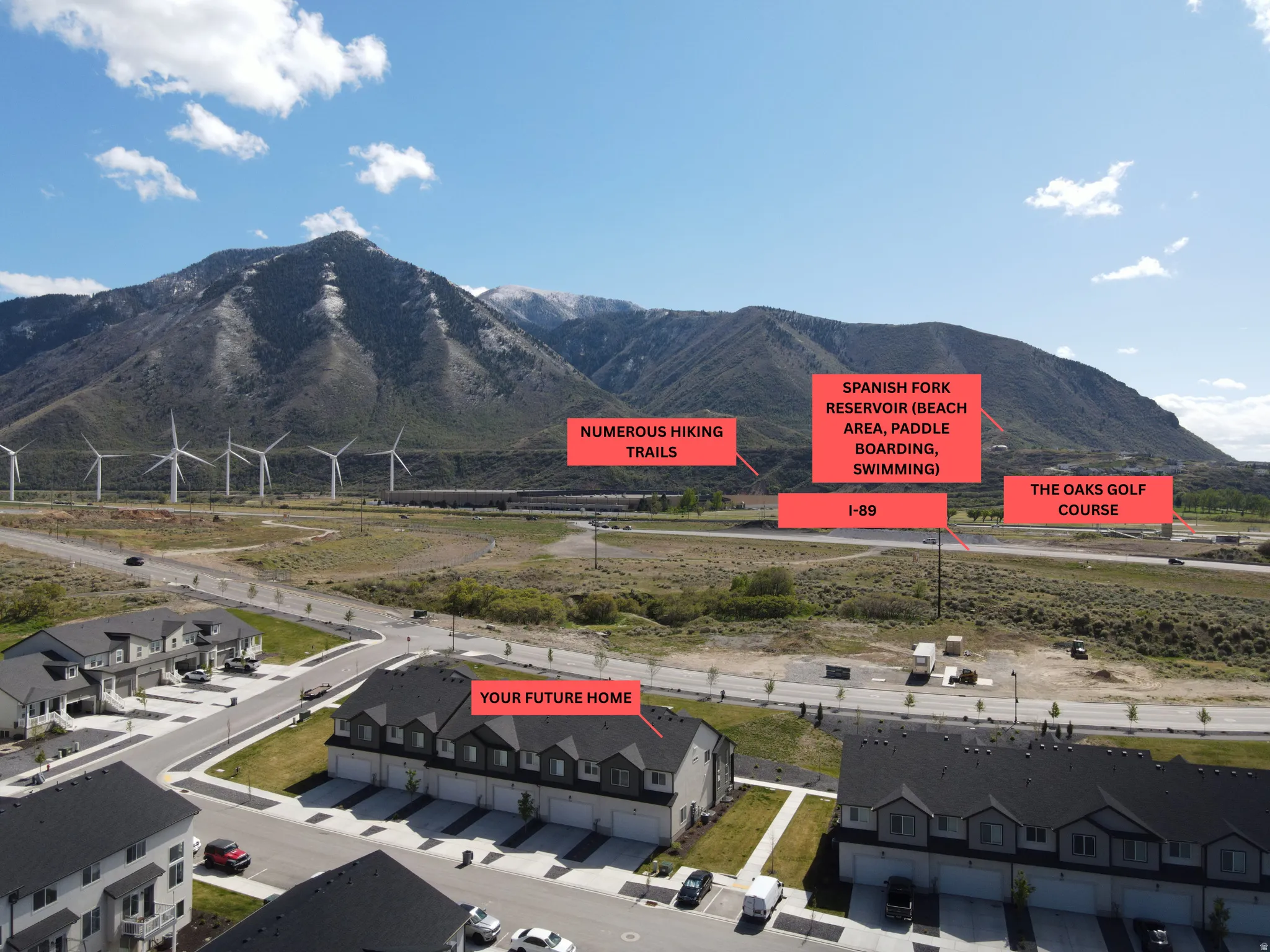 View of mountain background featuring nearby suburban area