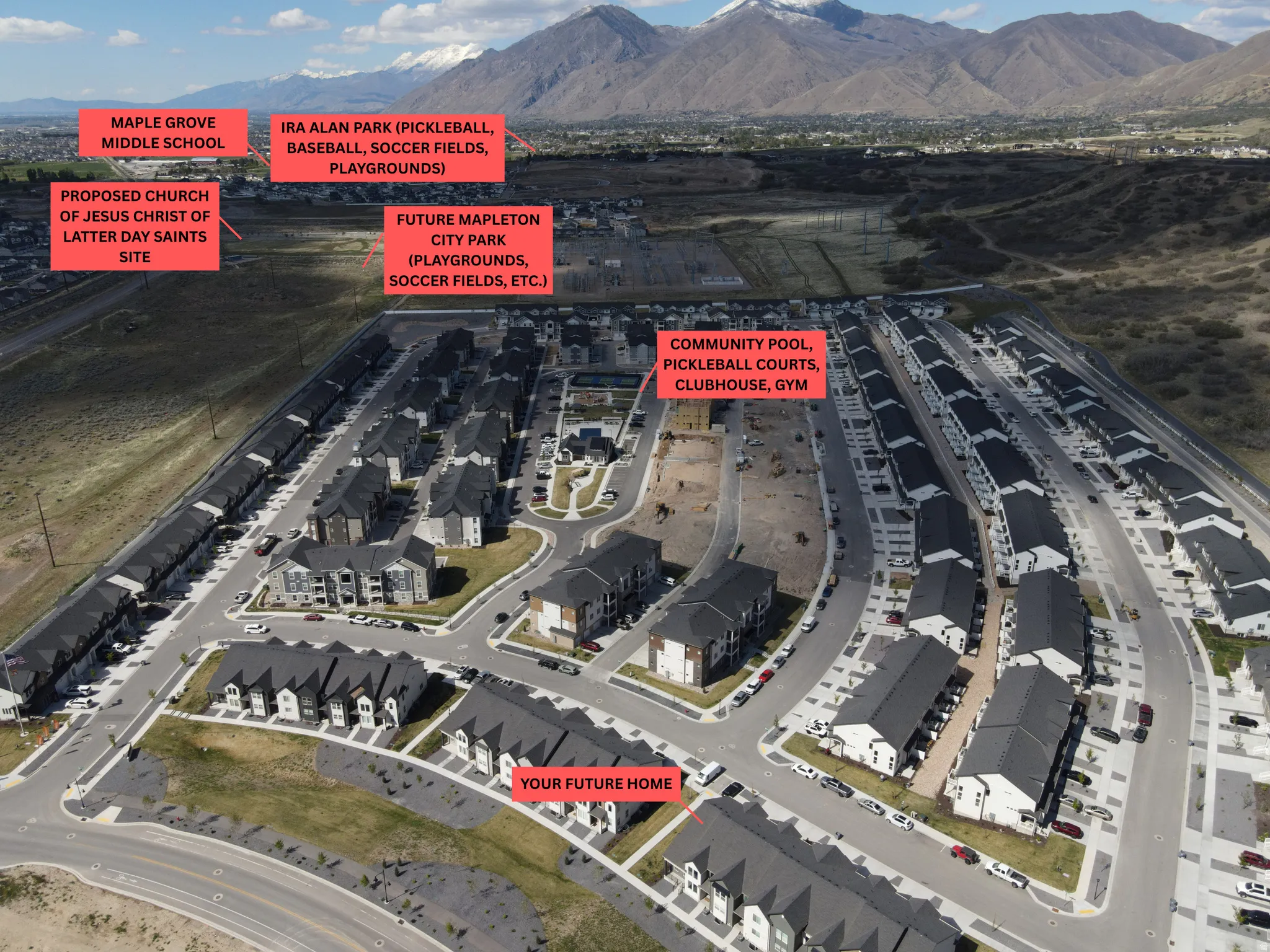 Aerial view of property's location with a mountainous background