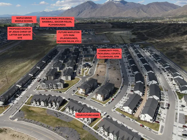 Aerial view of property's location with a mountainous background