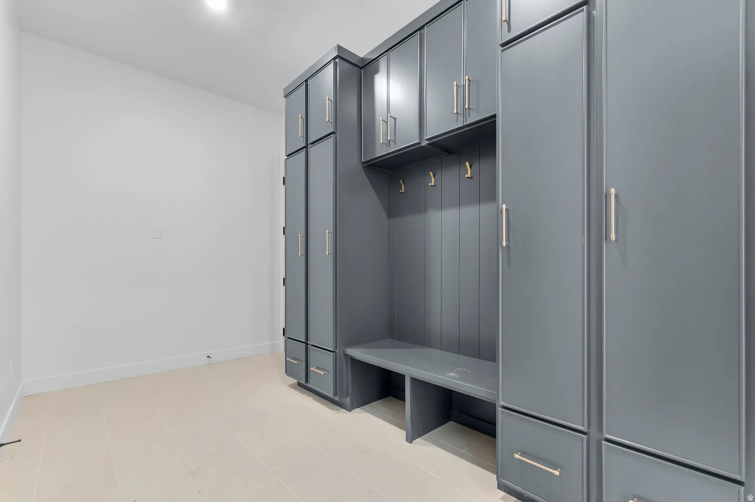 Mudroom featuring baseboards