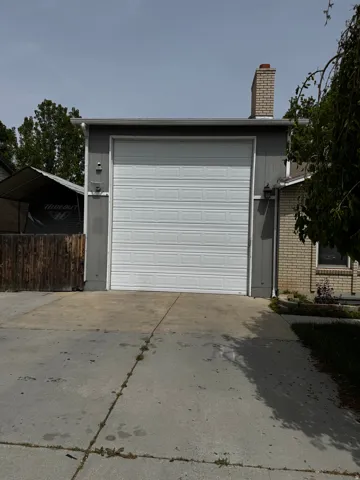Garage with concrete driveway