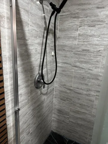 Bathroom view of a shower stall