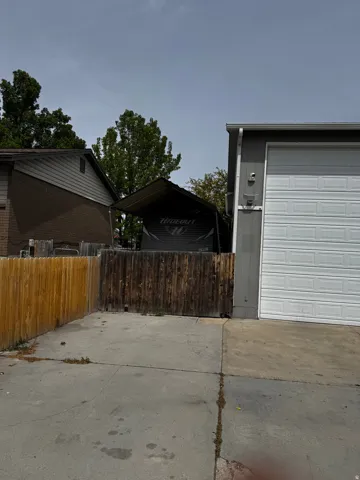 Garage featuring driveway