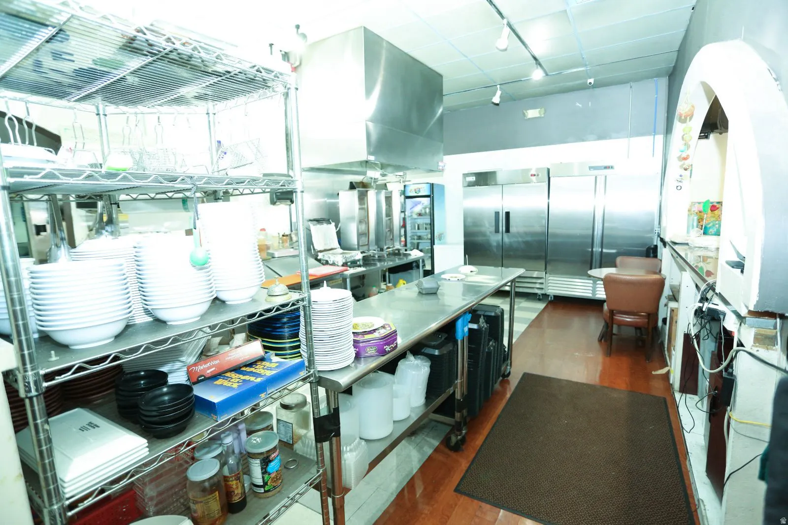 Kitchen featuring stainless steel built in fridge