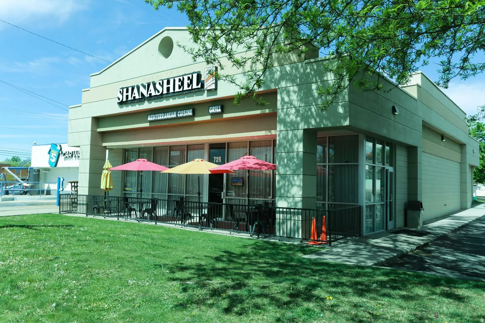 View of commercial location with a garage