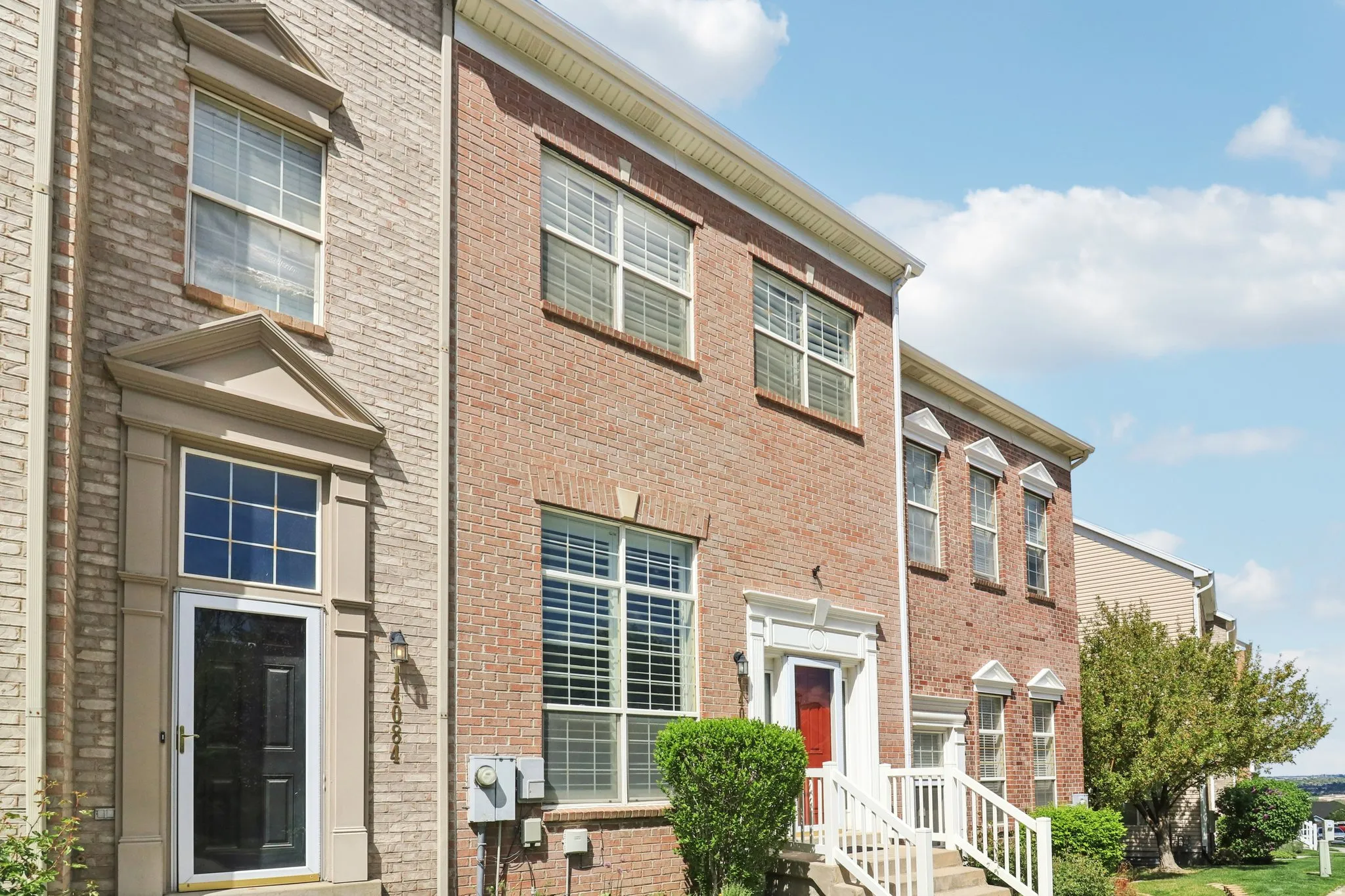 View of front of home with brick siding