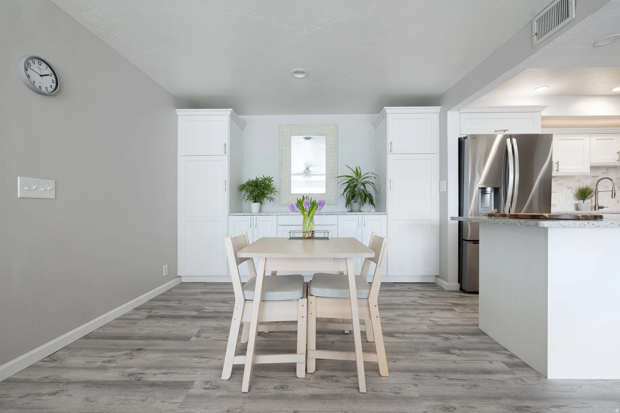 Dining room with light wood-style floors