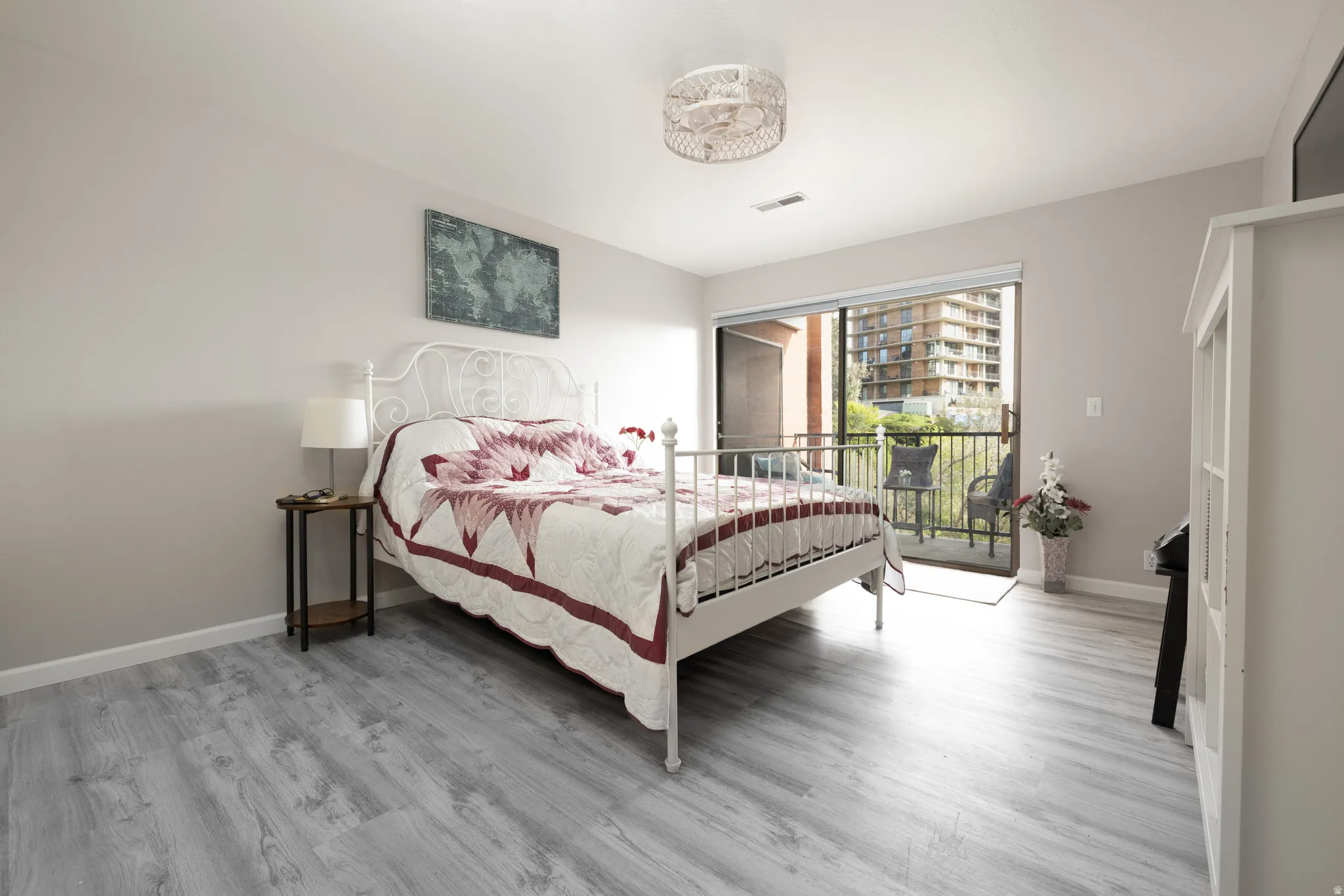 Bedroom featuring light wood-style flooring and access to outside