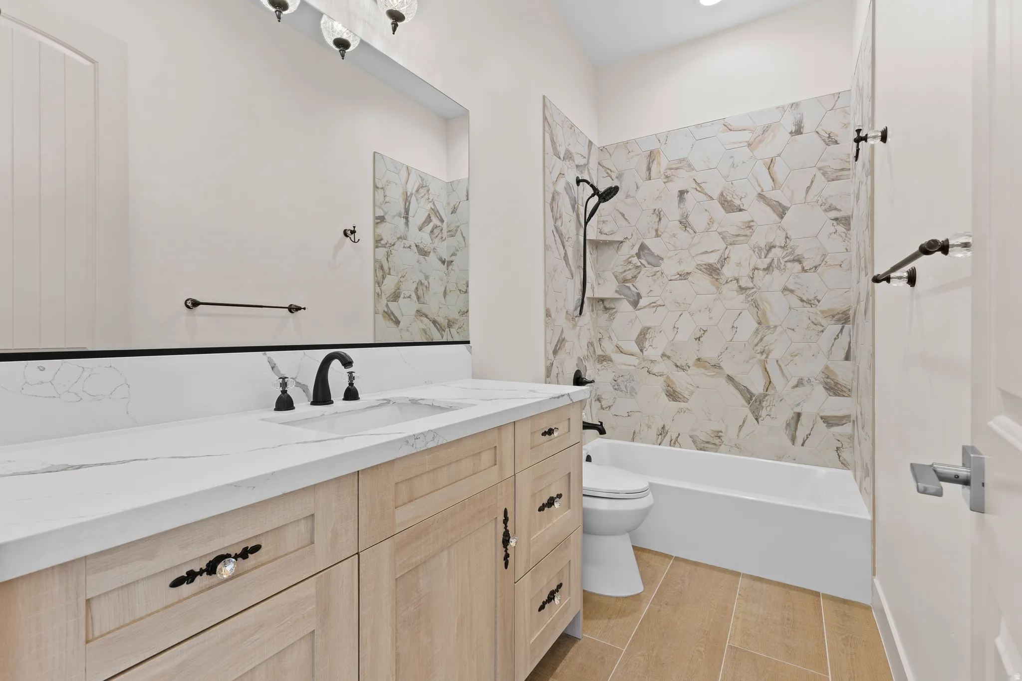 Full bathroom featuring vanity and  shower combination
