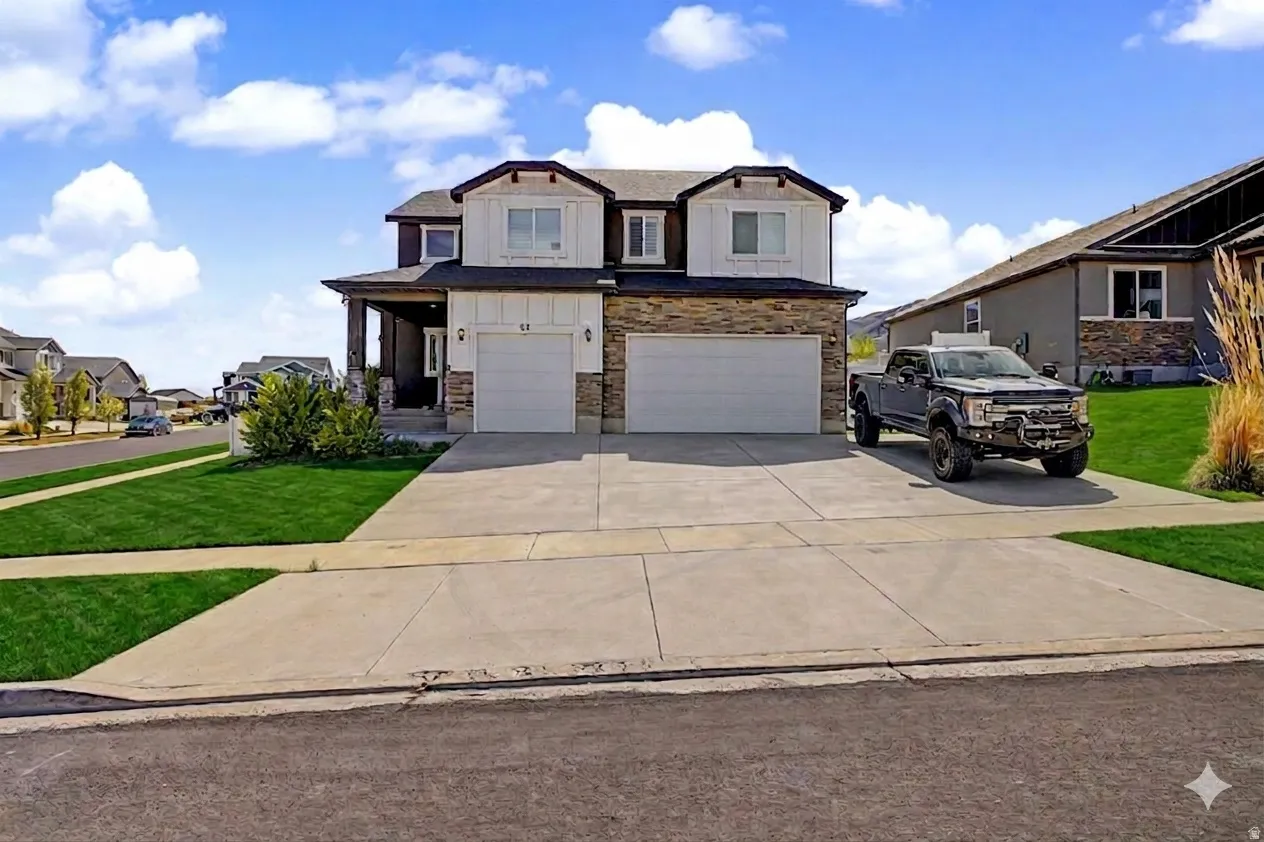 AI enhanced  front view of the Two-story residence featuring a stone and siding facade, a double-door garage, and an inviting covered porch