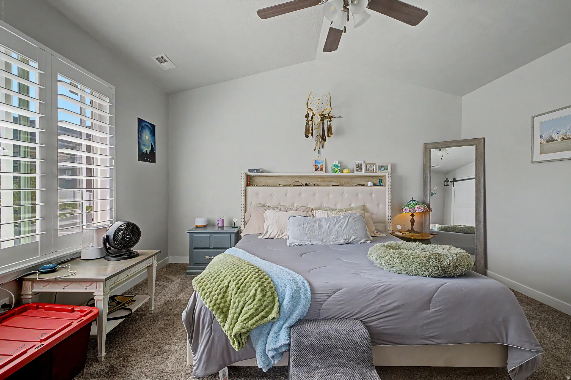 Bedroom featuring carpet and a ceiling fan