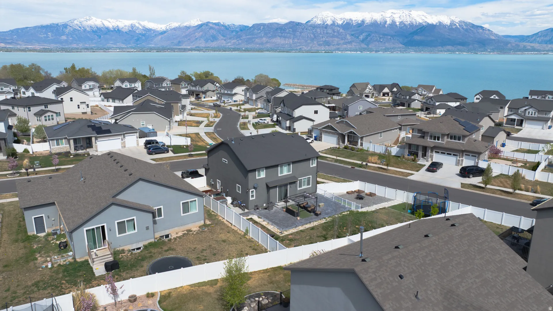 Aerial view of residential area with a water and mountain view