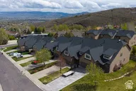 Aerial view of residential area featuring mountains