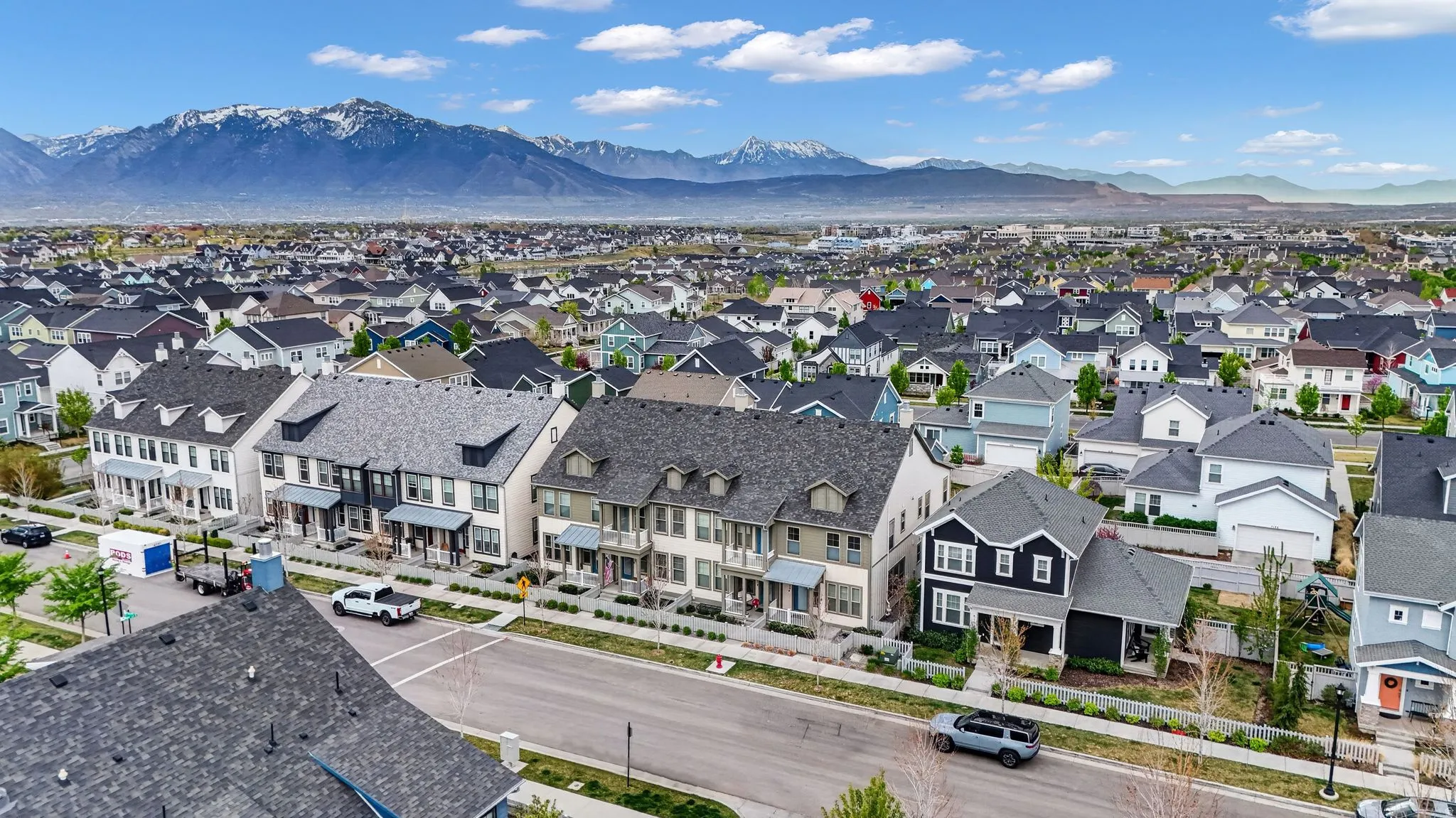 Aerial view of residential area with a mountain backdrop