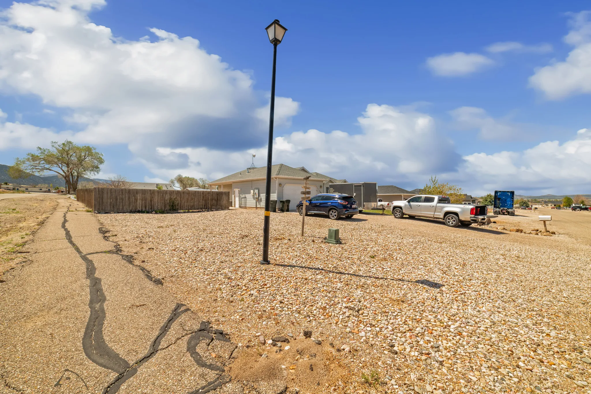 View of yard featuring a garage