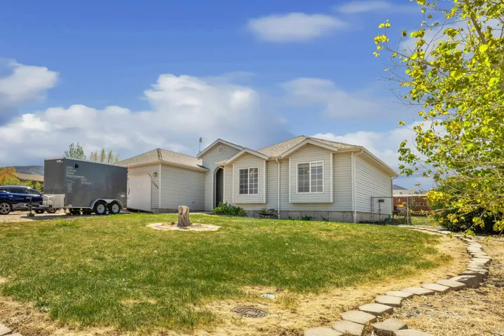 View of front of property featuring an attached garage