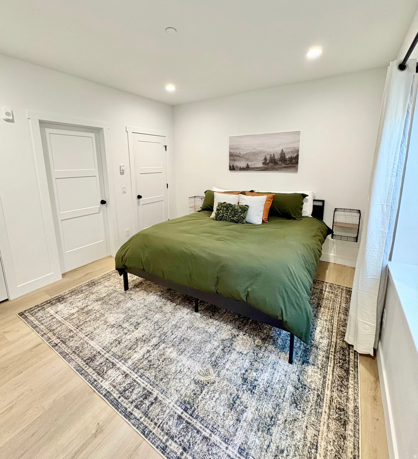 Bedroom featuring wood finished floors and recessed lighting
